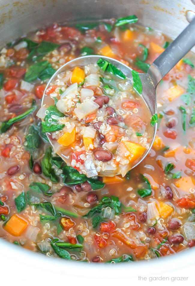 Quinoa black bean soup cooking in a stockpot
