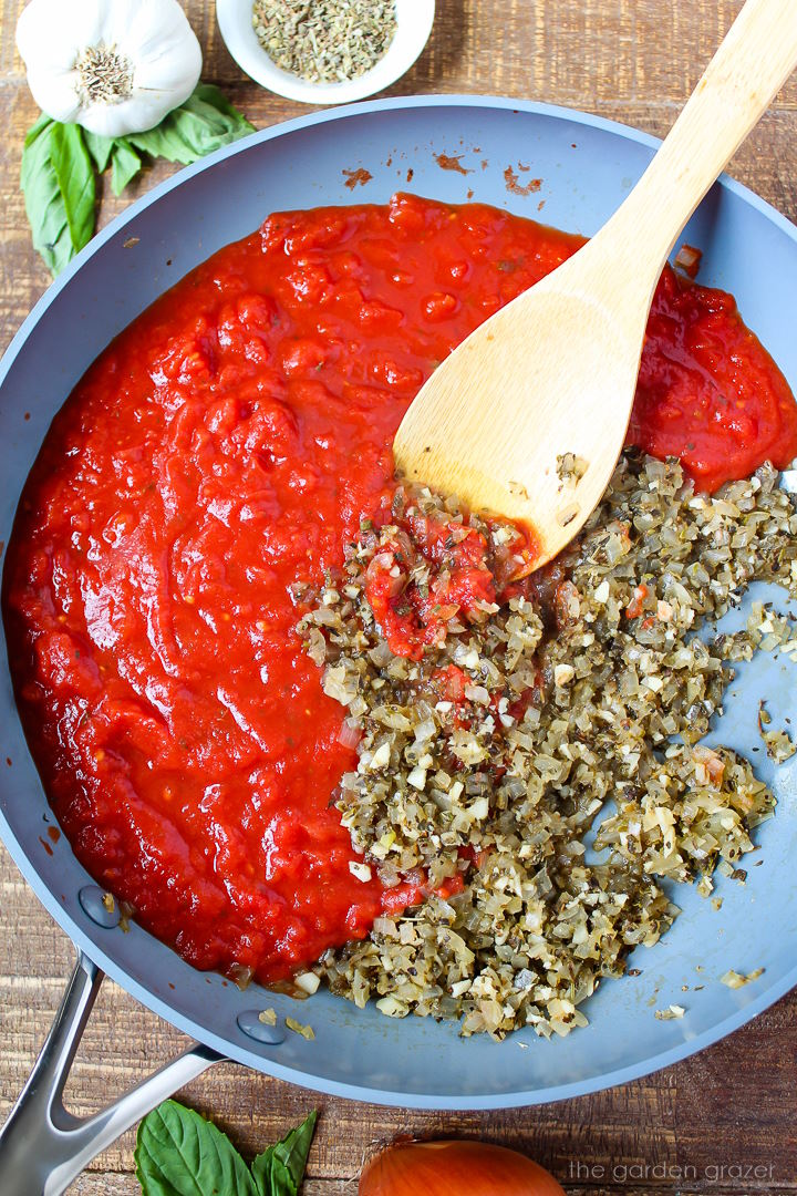 Preparing sauce ingredients in a large skillet before stirring together