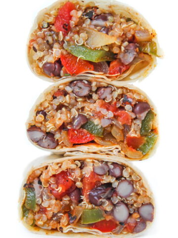 Vegan black bean quinoa burritos cut in half