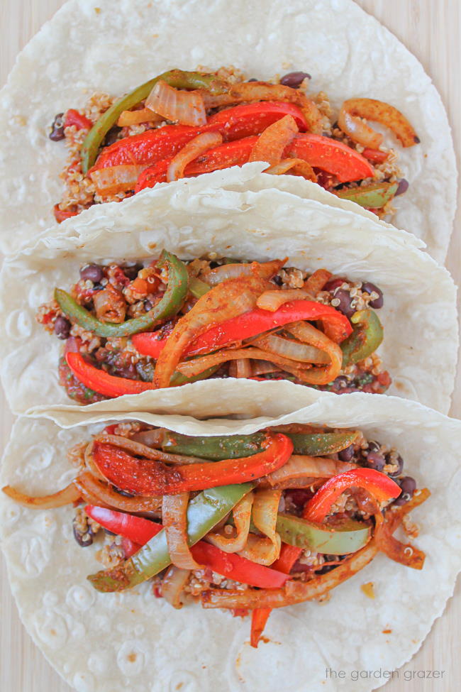 Three open-faced vegan quinoa burritos