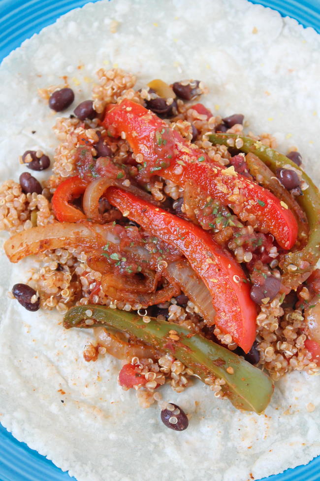 Open-faced tortilla with bean and bell pepper mixture