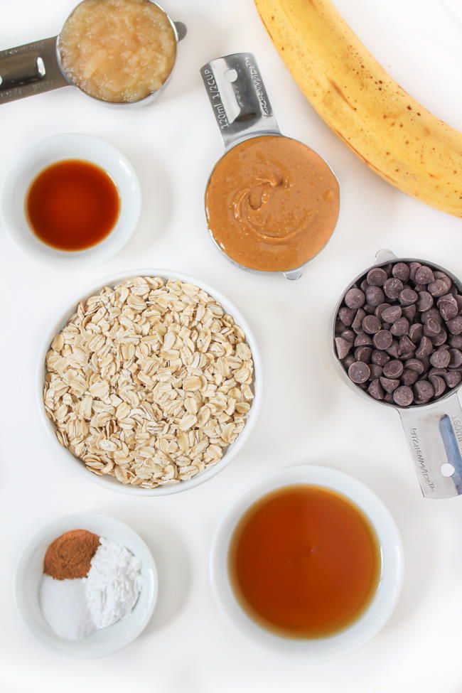 Ingredients on a table for vegan chocolate chip banana oatmeal cookies