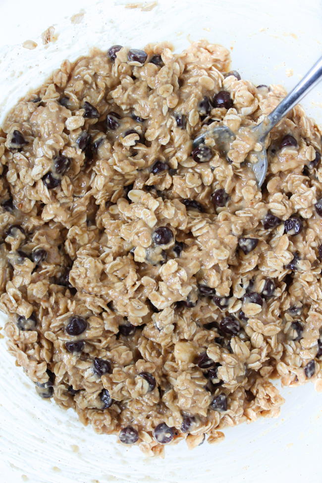 Mixed cookie dough in a bowl with spoon