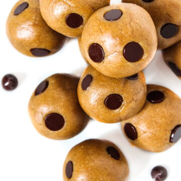 Healthy vegan cookie dough bites with chocolate chips on a white plate