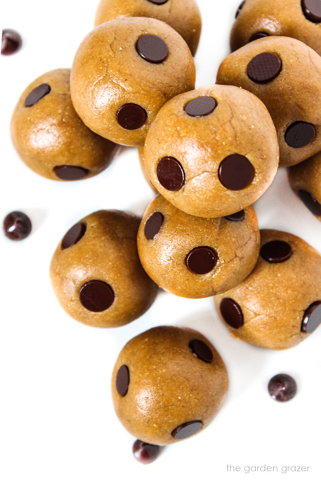 Vegan dough balls with chocolate chips on a white plate