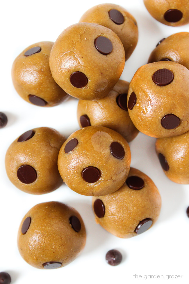 Vegan chocolate chip cookie dough bites arranged on a white plate