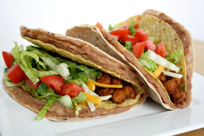 White plate with vegan chickpea tacos