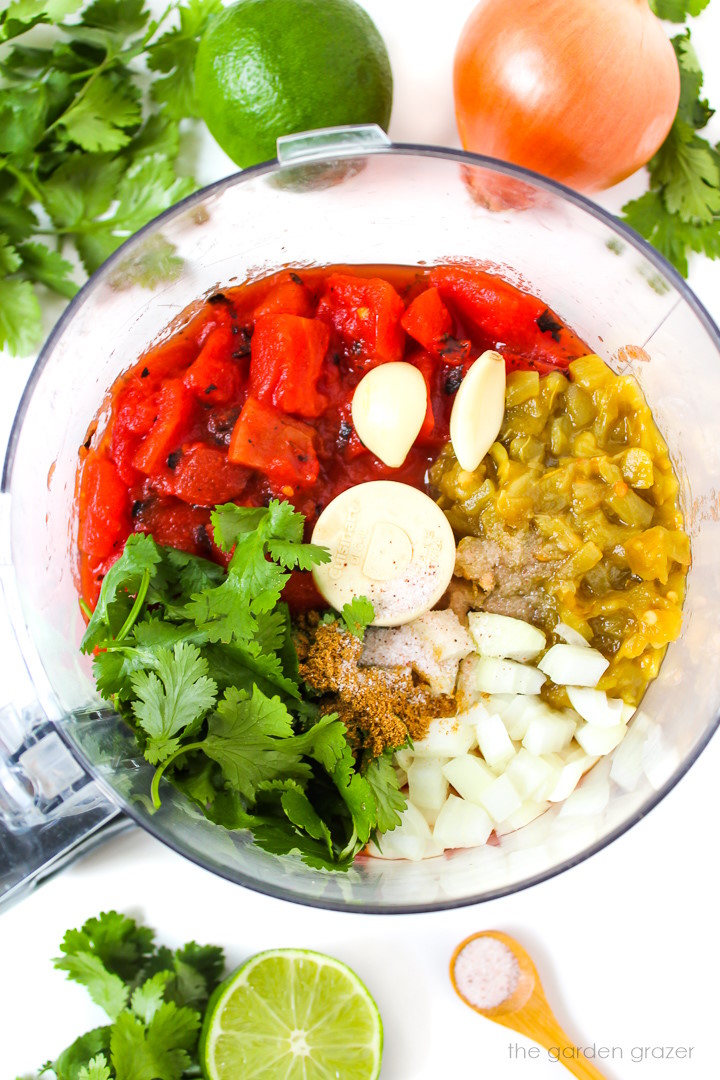 Overhead view of preparing ingredients in a food processor before blending together
