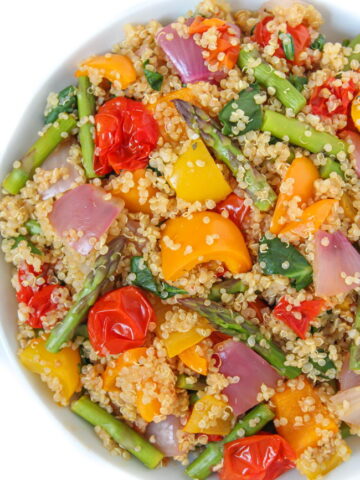 Bowl of vegan roasted vegetables with quinoa