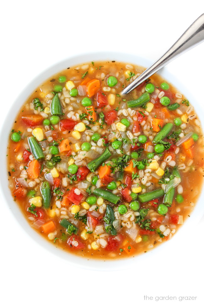 Soup in a white bowl with spoon