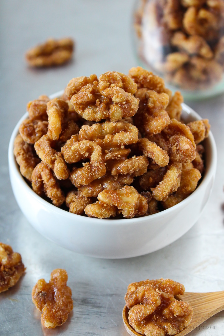 Maple vanilla candied nuts in a small white serving bowl