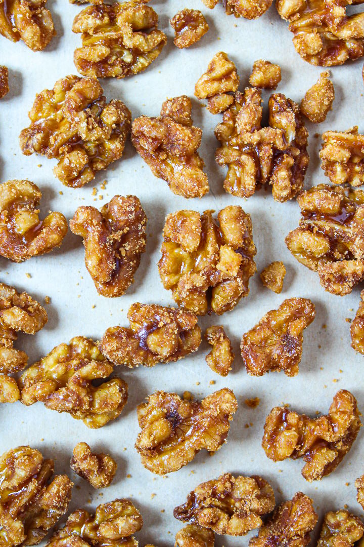 Overhead view of maple vanilla candied nuts spread out on a tray