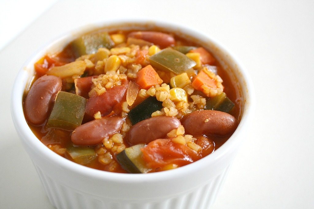 Bowl of vegetable bulgur chili with beans