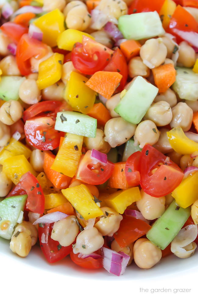 Close-up view of vegan chickpea vegetable salad in a bowl