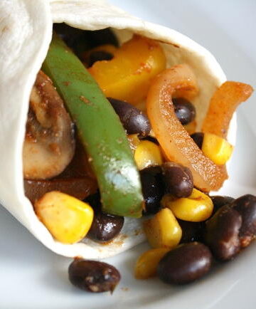 Black bean fajitas in a tortilla on a plate