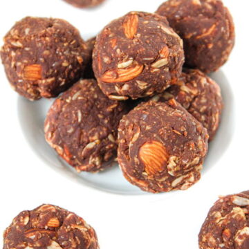 Small bowl of vegan chocolate peanut butter oat balls