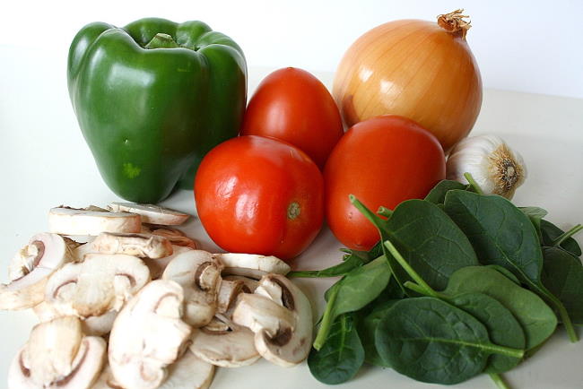 Raw vegetable ingredients for quinoa casserole on a table