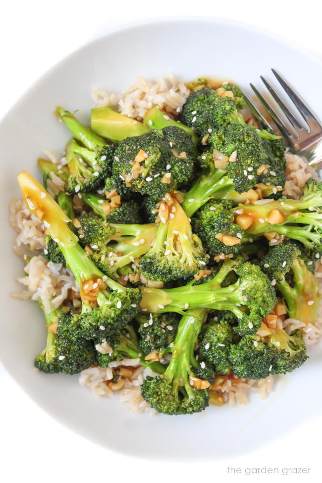Bowl of broccoli with Asian Garlic Sauce sprinkled with sesame seeds