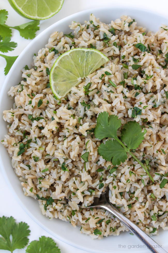 Cilantro lime brown rice in a bowl with spoon