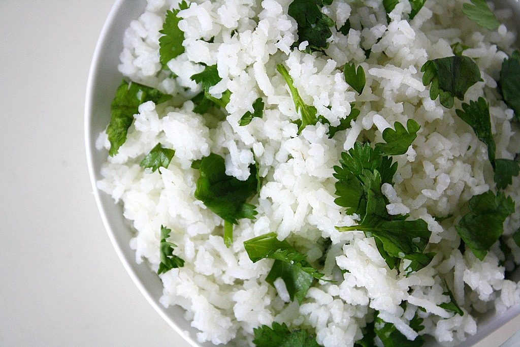 Close up view of cilantro lime rice in a small bowl