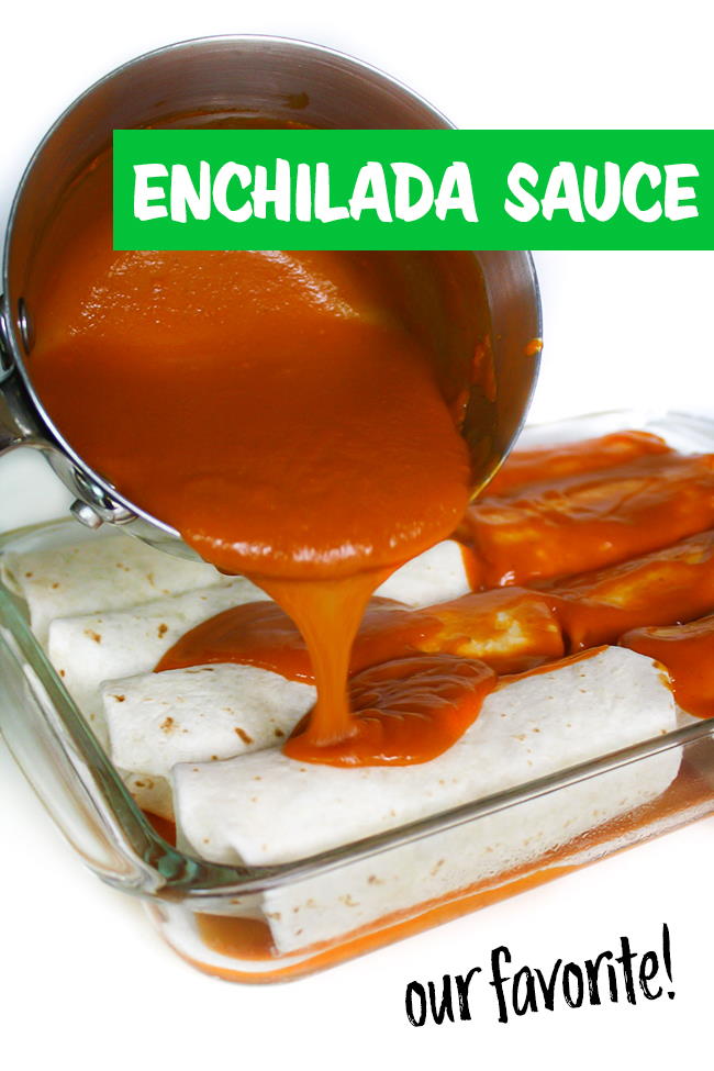 Enchilada sauce being poured from pan over the top of enchiladas