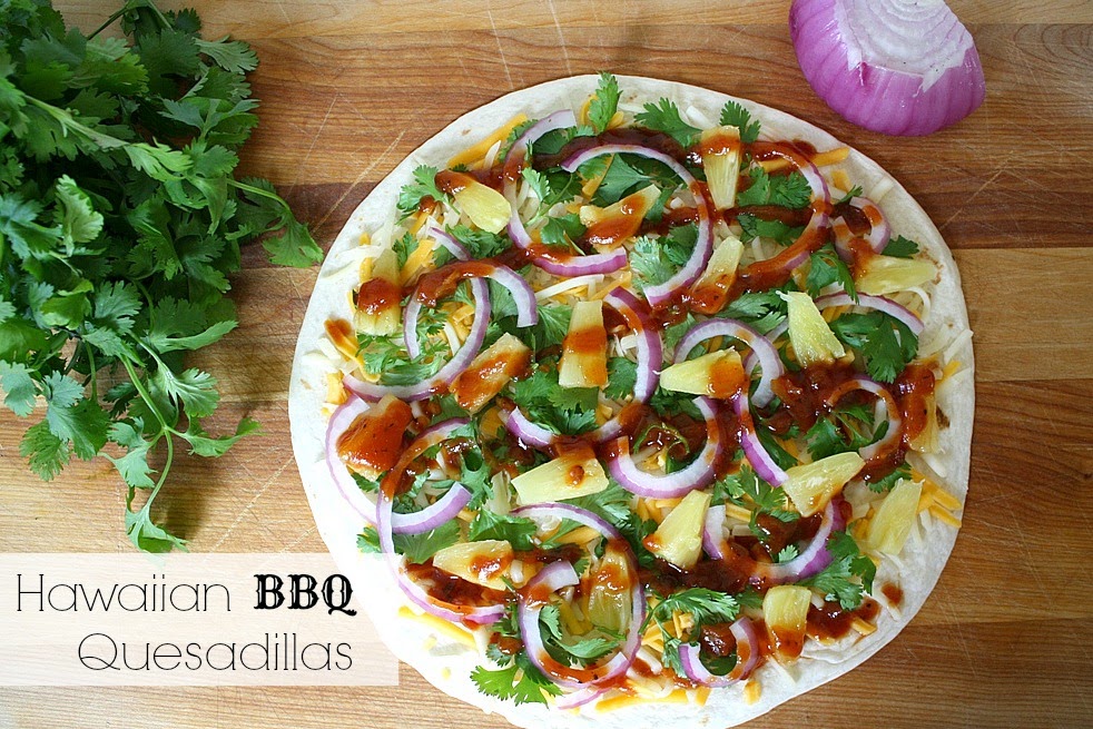 Vegan Hawaiian BBQ quesadilla with pineapple on a cutting board