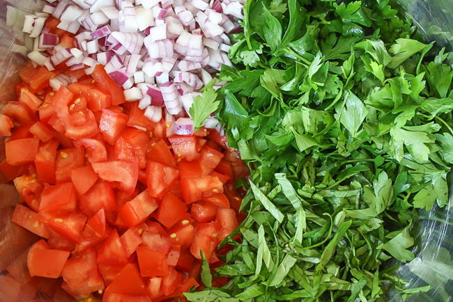 Diced vegetables for tomato fettuccine preparation