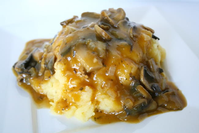 Plate with mashed potatoes and vegan mushroom gravy