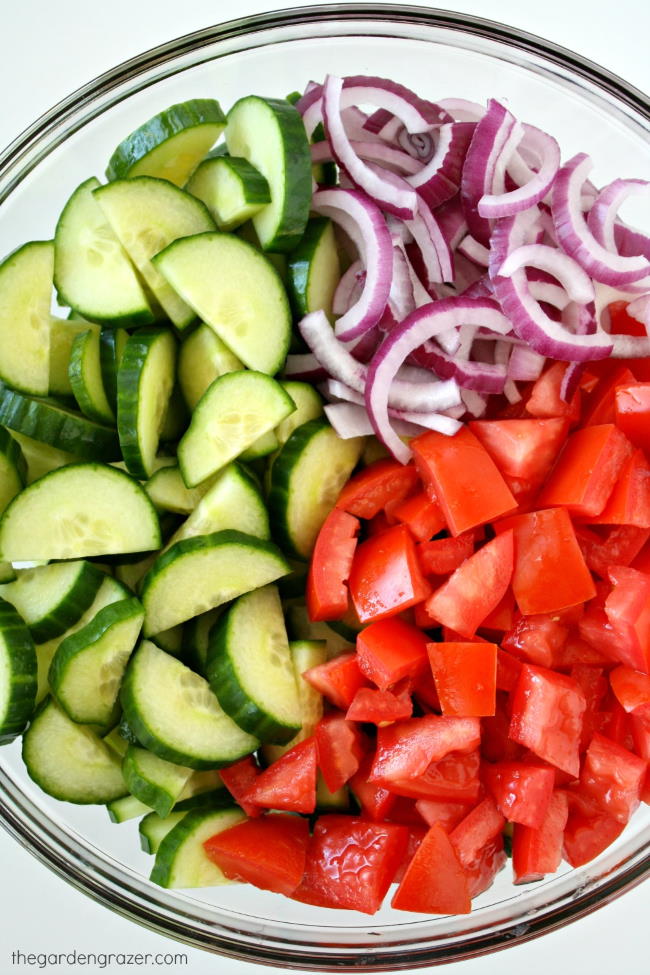 Fresh produce and ingredients in a glass bowl