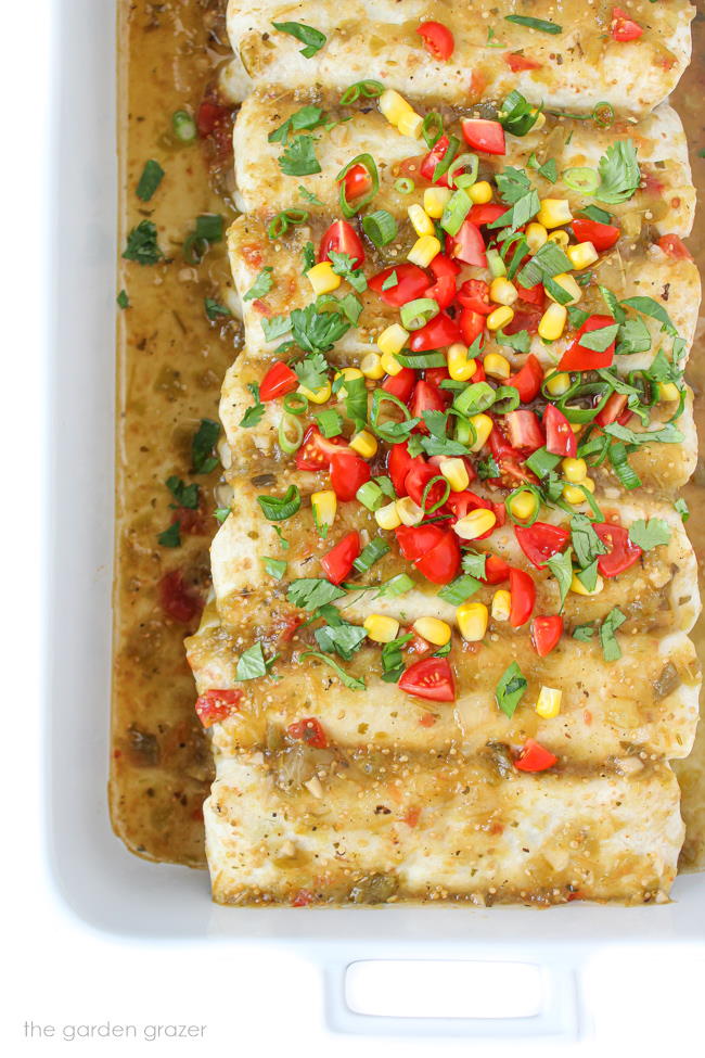 Vegan white bean zucchini enchiladas in a white pan