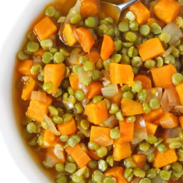 Vegan split pea soup with sweet potato in a white bowl