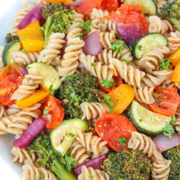 Vegan roasted vegetable pasta with balsamic in a white bowl