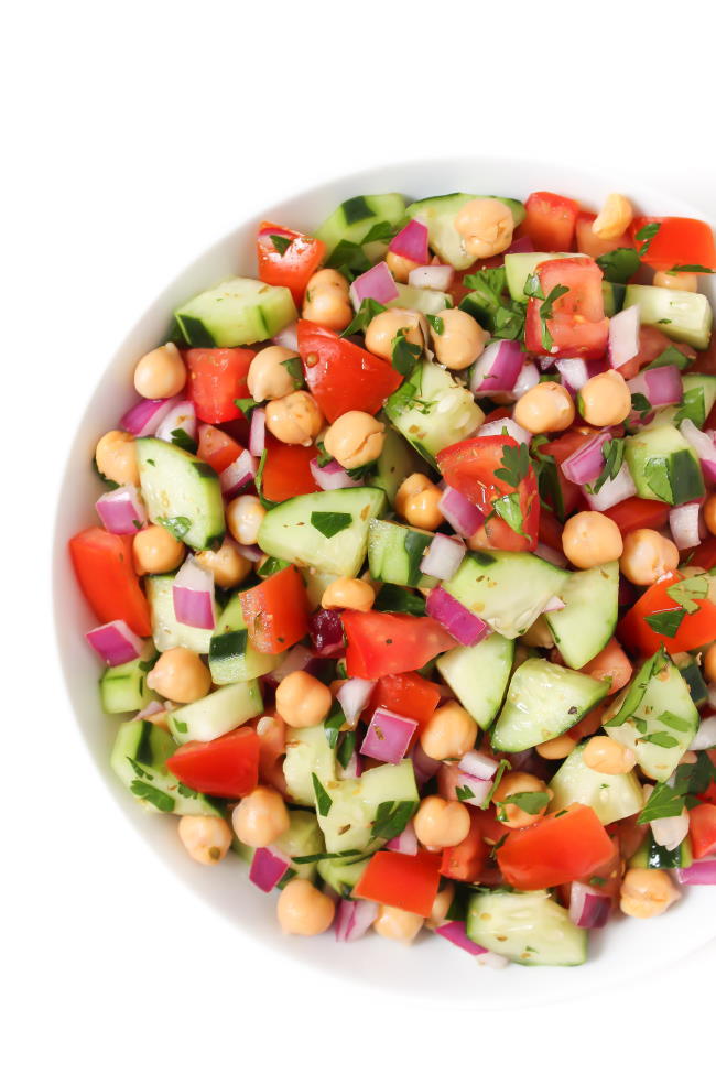 Vegan Greek Salad with tangy dressing in a bowl