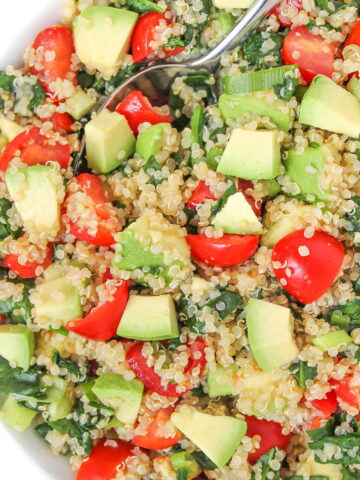 Quinoa avocado power salad in a white bowl