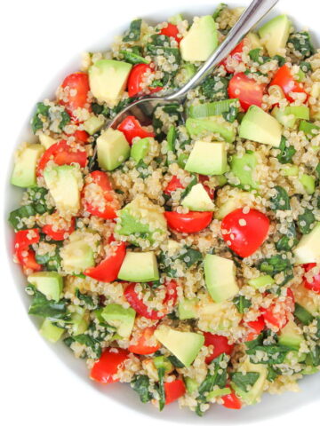 Quinoa Avocado Spinach Power Salad in a bowl with spoon