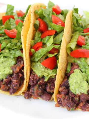 Black bean tacos on a white plate