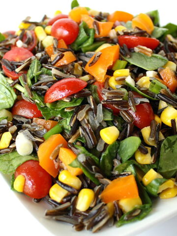 Wild rice salad on a white plate