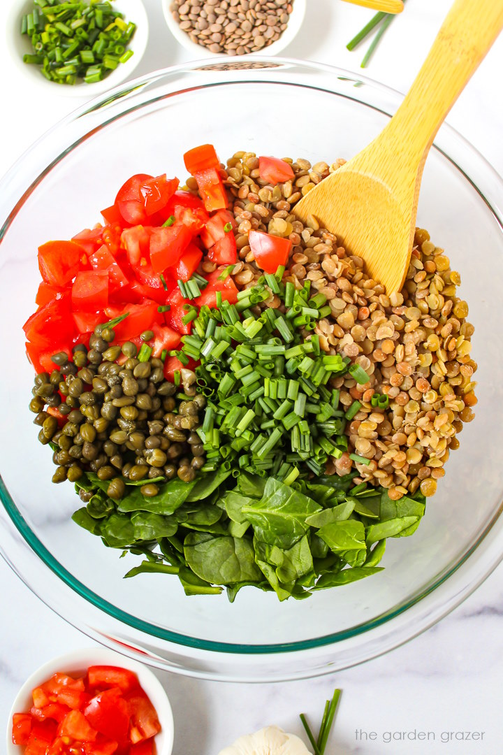 Overhead view of ingredients in a glass bowl before mixing together