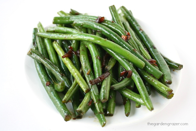 Plate of cooked veggies in garlic sauce