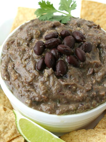 Black bean avocado dip in a white bowl