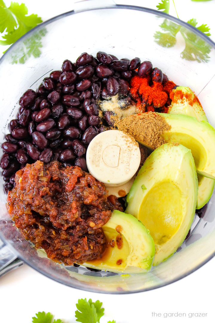Overhead view of preparing dip ingredients in a food processor before blending