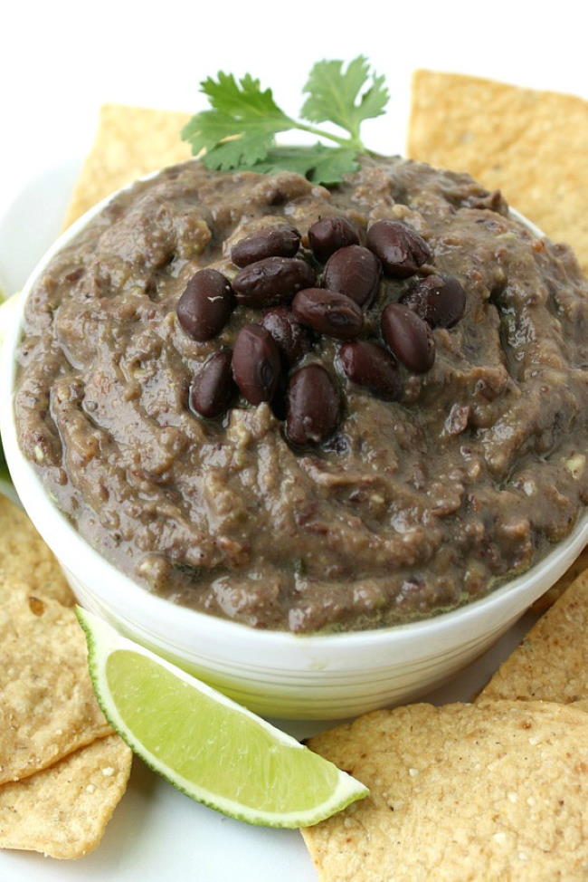 Blender black bean avocado dip in a small white bowl