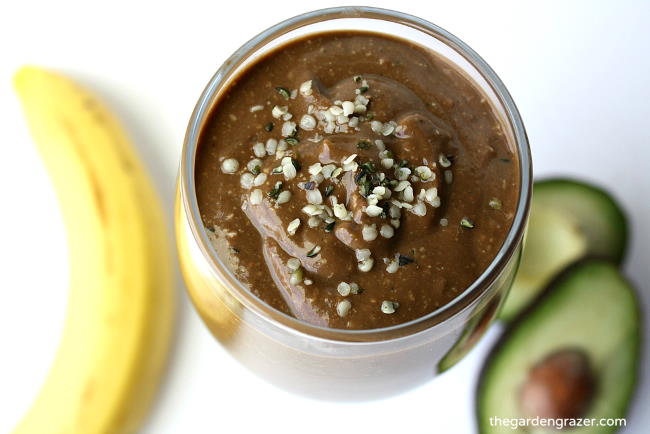 Glass of vegan chocolate banana avocado smoothie