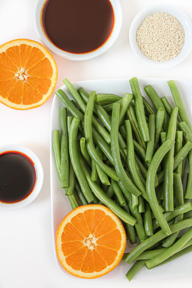 Fresh ingredients laid out on a white table