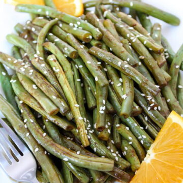 Hoisin orange roasted green beans on a plate