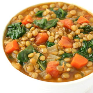 Bowl of vegan lentil spinach soup