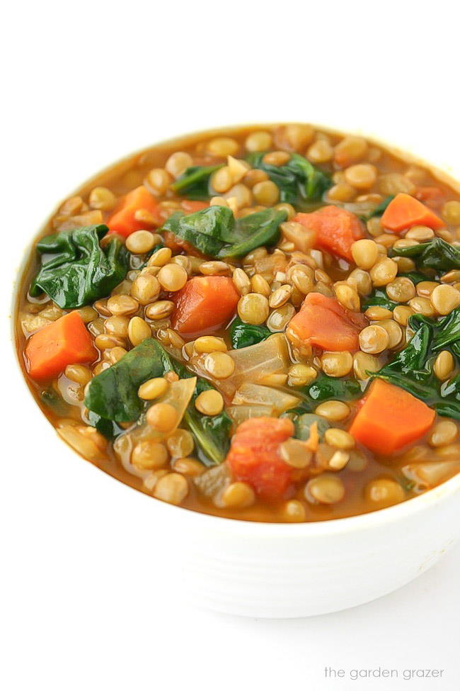 Bowl of vegan lentil spinach soup