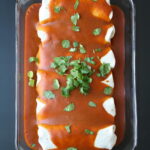 Pan of protein monster vegan enchiladas hot from the oven