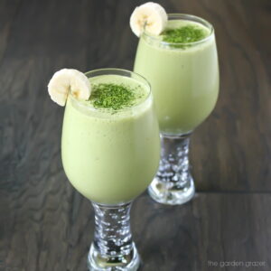 Two glasses of vegan coconut vanilla matcha smoothies