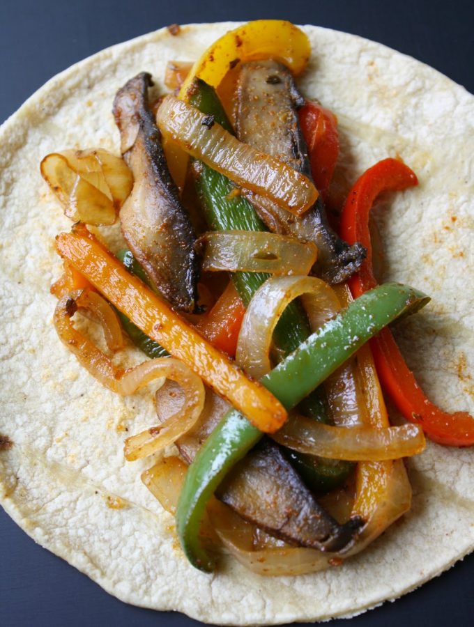 Vegan portobello mushroom fajitas on a corn tortilla